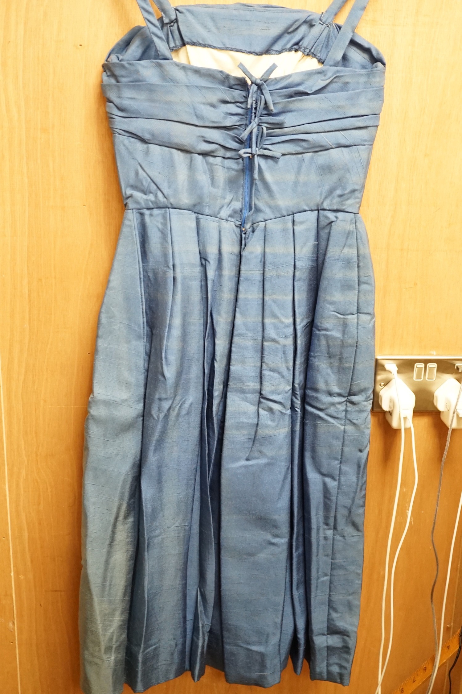 A 1950’s blue silk ladies cocktail dress